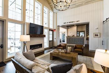 Designer clubhouse featuring entertainment kitchen, games, and lounge seating